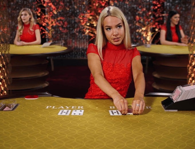 Live Baccarat female dealer red